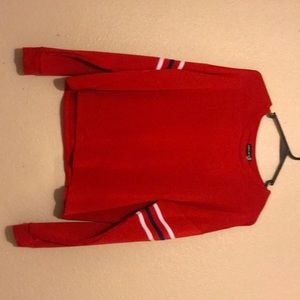 A red long sleeve top